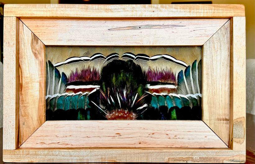 Wing panel in hard maple layering iridescent teal, purple, and barred drake plumage